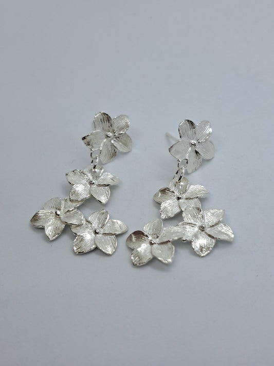 Brincos frangipani longos