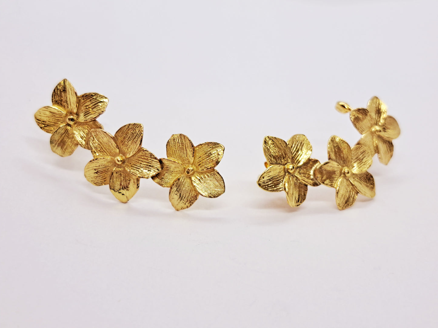 Frangipani earcuffs