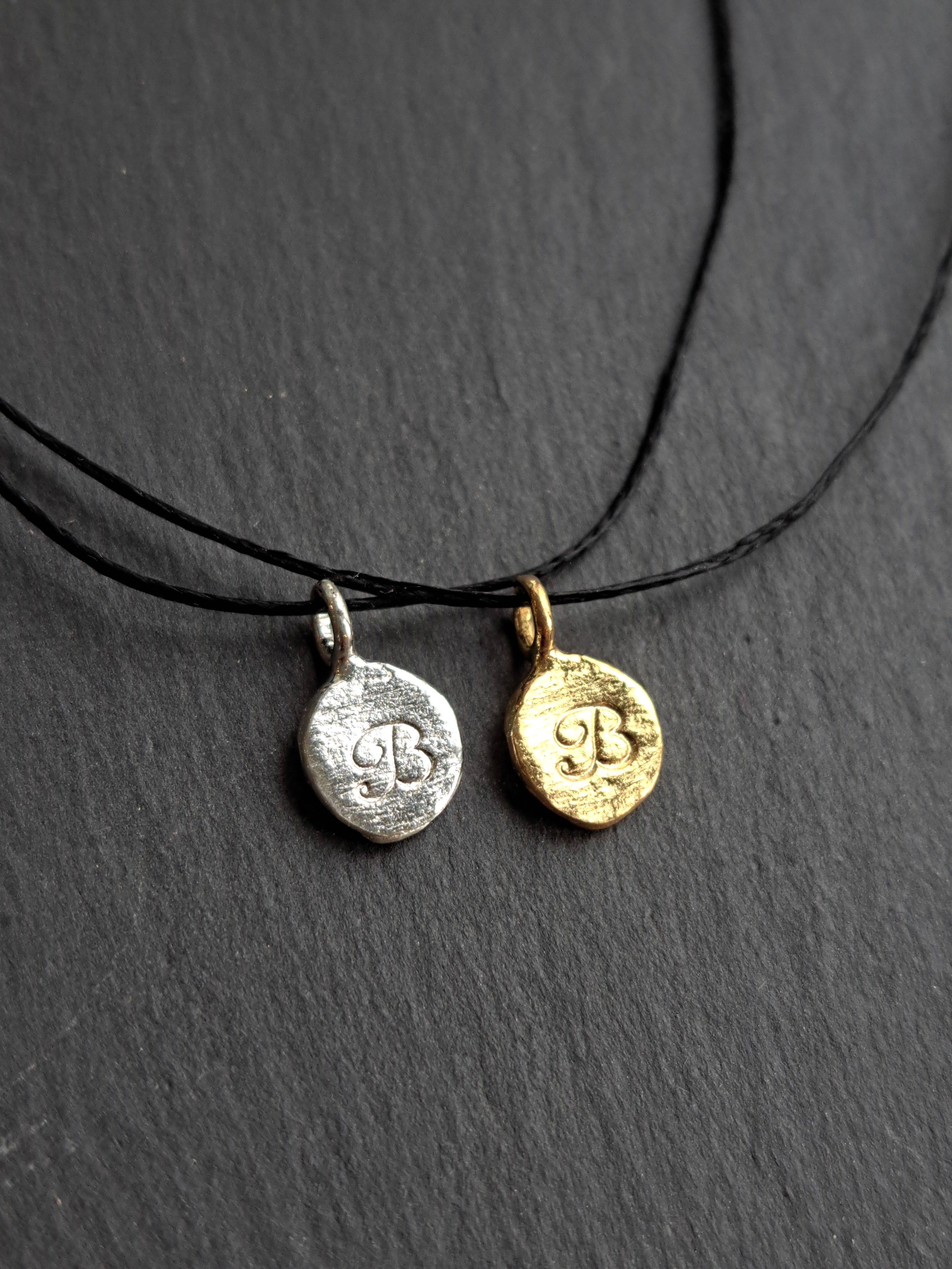 Mini-médaille initiale